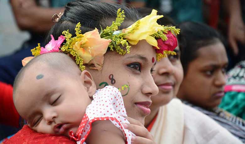 মাথায় ফুল গালে আলপনা