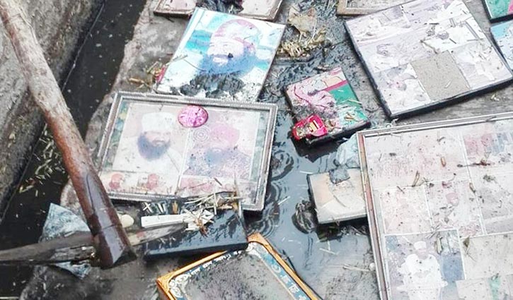 Angry followers dump Ram Rahim's photos in gutter