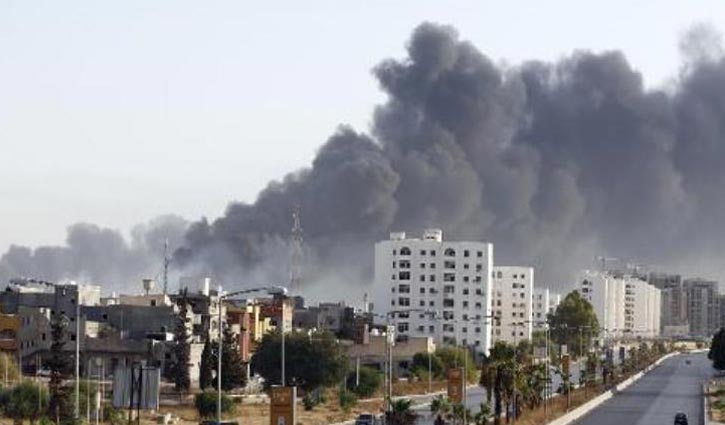 Clashes in Libyan capital kill 9, close airport