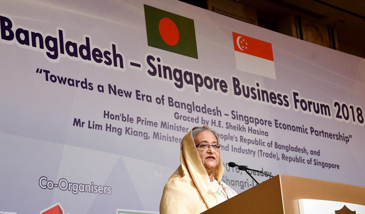 PM urges Singapore businessmen to become partner in progress