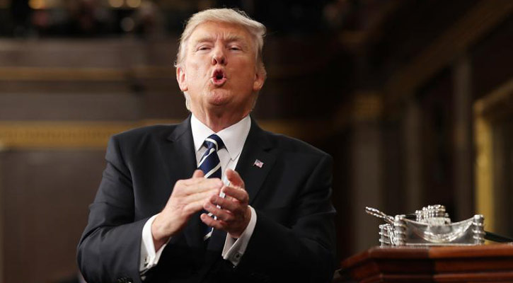 New Trump order takes Iraq out of travel ban