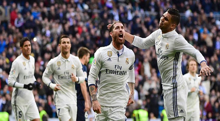 Ramos leads Real Madrid to beat Malaga 2-1