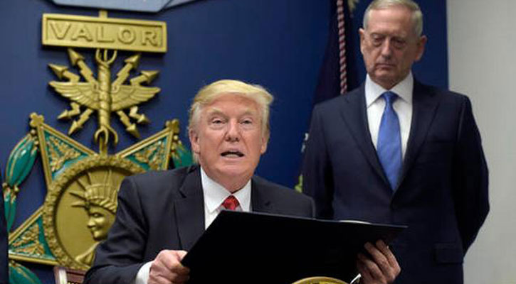Trump signs 'extreme vetting' order to limit immigration