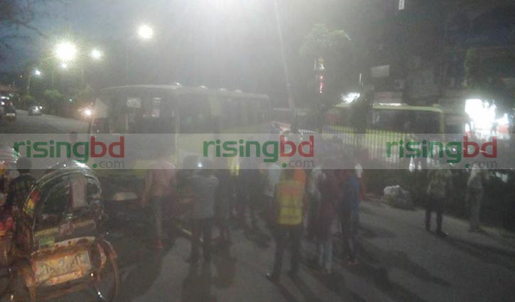 Bus crushes into road island in city