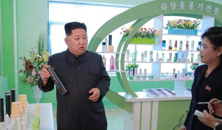 Kim Jong-un visits cosmetics factory with wife and sister