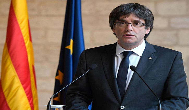 Puigdemont, four associates surrender to Belgian police