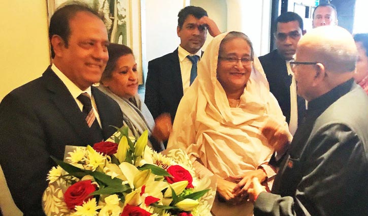 PM reaches London en route home