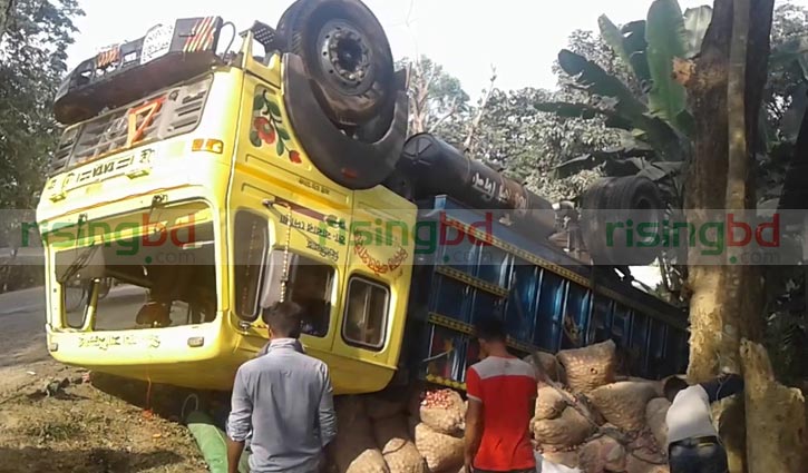 Van driver crushed under truck in Gopalganj