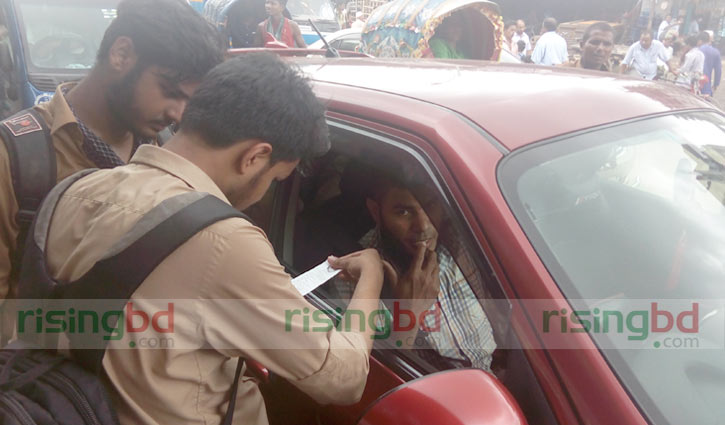 Students checking drivers’ licences