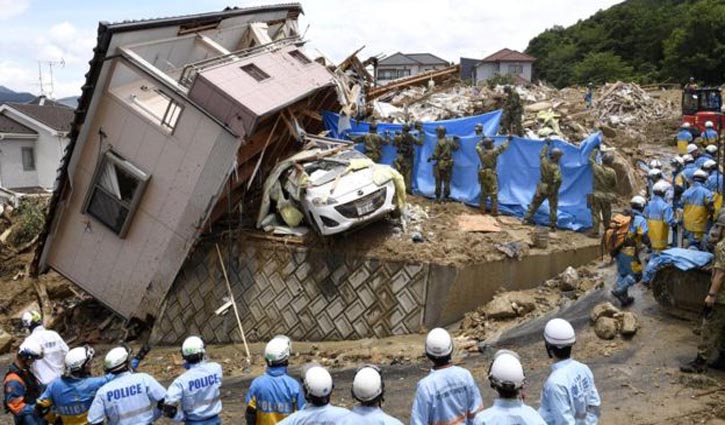 100 dead after record rainfall in Japan