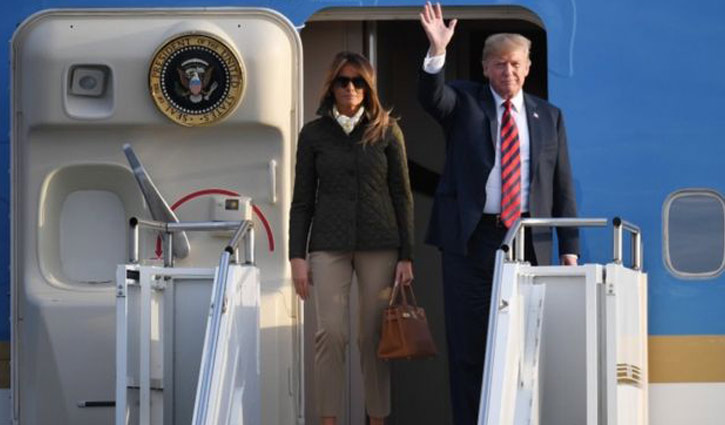 Trump arrives in Scotland amid protests
