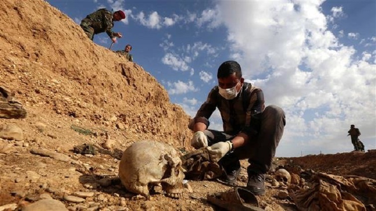 More than 200 mass graves discovered in Iraq: UN