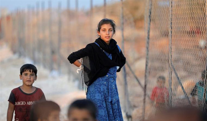 Turkey warns Europe of 'new wave' of Syrian refugees