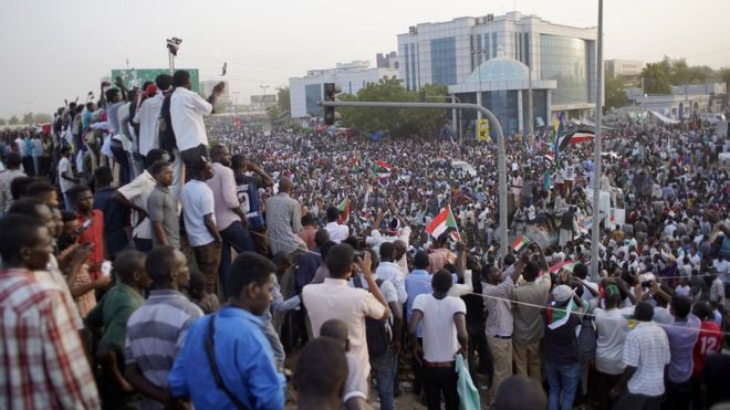 Sudan protesters defy curfew after military ousts Bashir