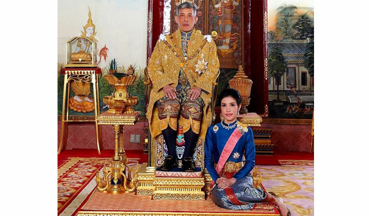 Thai king strips consort of titles for 'disloyalty'