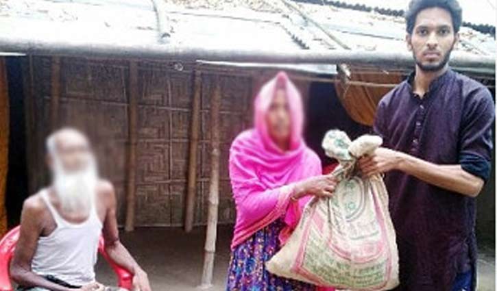 Risingbd stands beside Nurjahan's family