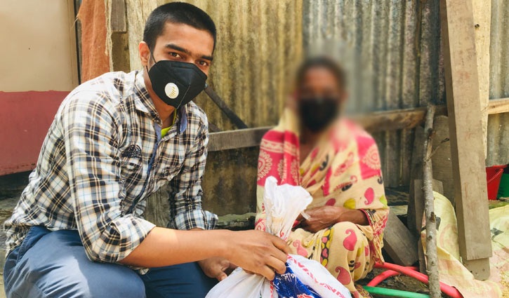 Risingbd stands beside ‘Golapir Ma’