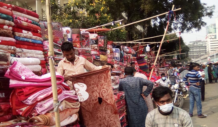 শীতের তীব্রতা বাড়ার অপেক্ষায় কাপড় ব্যবসায়ীরা শীতের তীব্রতা বাড়ার অপেক্ষায় কাপড় ব্যবসায়ীরা
