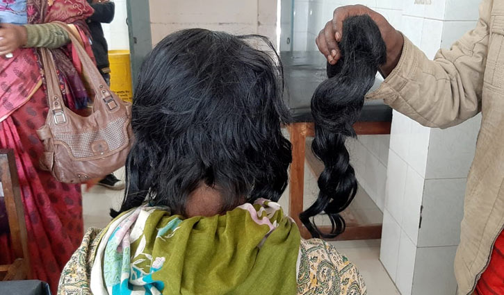 Woman's hair cut off over family dispute