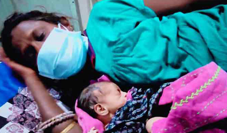 রাস্তায় সন্তান জন্ম দিলেন মানসিক ভারসাম্যহীন নারী রাস্তায় সন্তান জন্ম দিলেন মানসিক ভারসাম্যহীন নারী