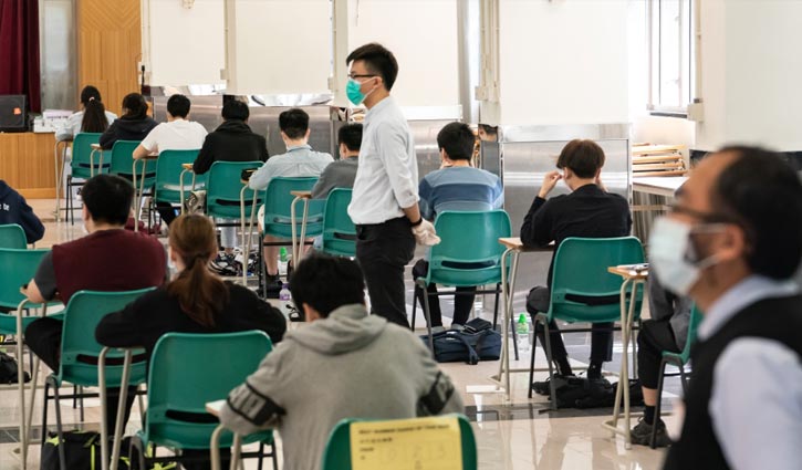 Hong Kong shuts down schools again