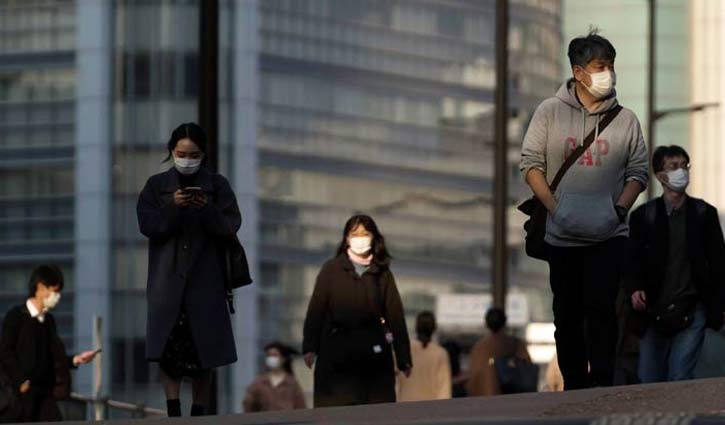 Japan reports new record of coronavirus cases in a day