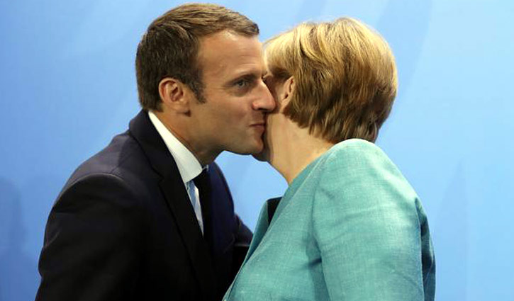 France bans gatherings, frowns on kissing