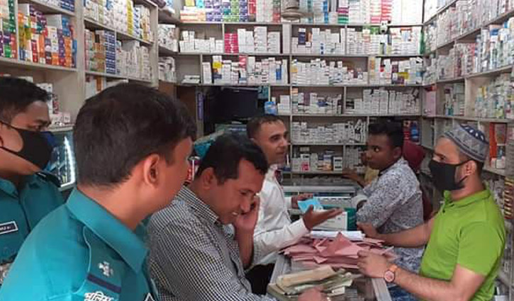 Pharmacy fined for hiking mask prices in Dhaka