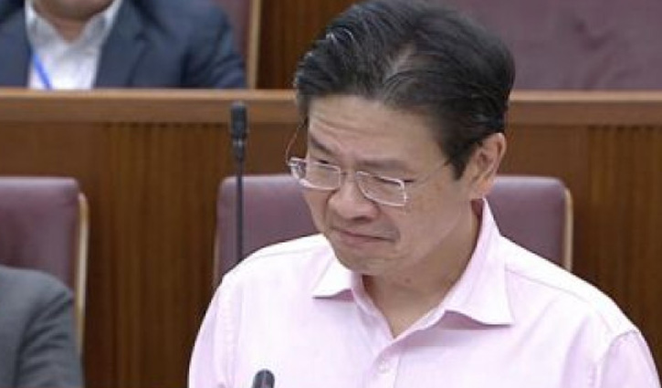 Singapore Minister breaks into tears in parliament
