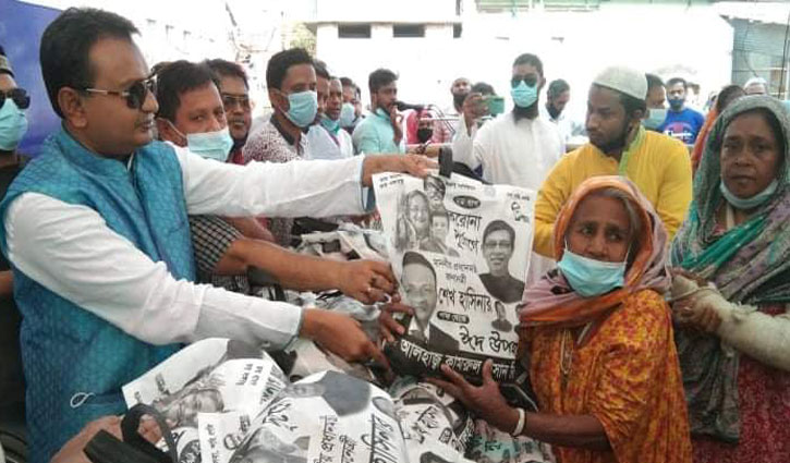 ৬০০ পরিবারের মাঝে ঈদ উপহার বিতরণ করলেন রিপন ৬০০ পরিবারের মাঝে ঈদ উপহার বিতরণ করলেন রিপন