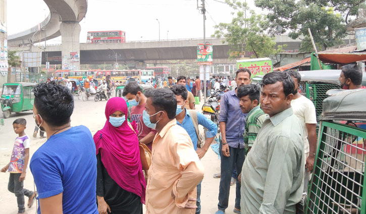 চলছে না আন্তঃজেলা বাস, তবু ঢাকা ছাড়ছে মানুষ চলছে না আন্তঃজেলা বাস, তবু ঢাকা ছাড়ছে মানুষ