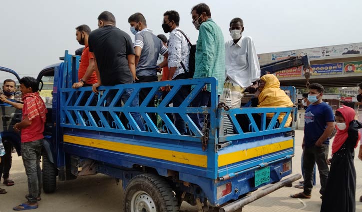 ছোট যানবাহনে বাড়ির পথে উত্তরবঙ্গের মানুষ ছোট যানবাহনে বাড়ির পথে উত্তরবঙ্গের মানুষ