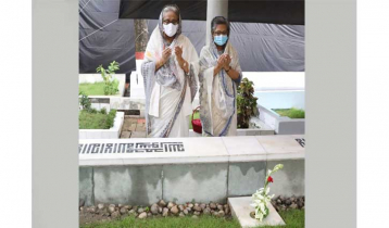 PM offers prayers at her martyred family members’ Banani graves PM offers prayers at her martyred family members’ Banani graves
