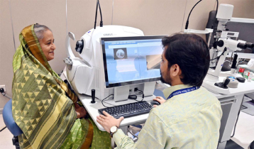 PM receives eye check-up purchasing Tk10 ticket