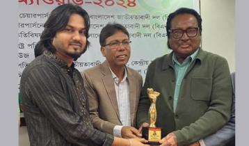 ‘ট্র্যাব অ্যাওয়ার্ড’ পেলেন রুহুল আমিন ভূঁইয়া