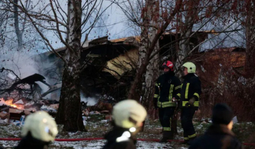 Cargo plane crashes into a house in Lithuania, killing at least 1