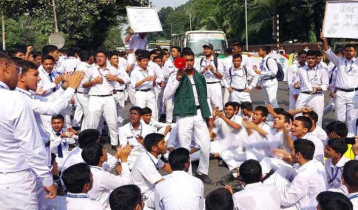 Residential college students block Mirpur Road for admission test