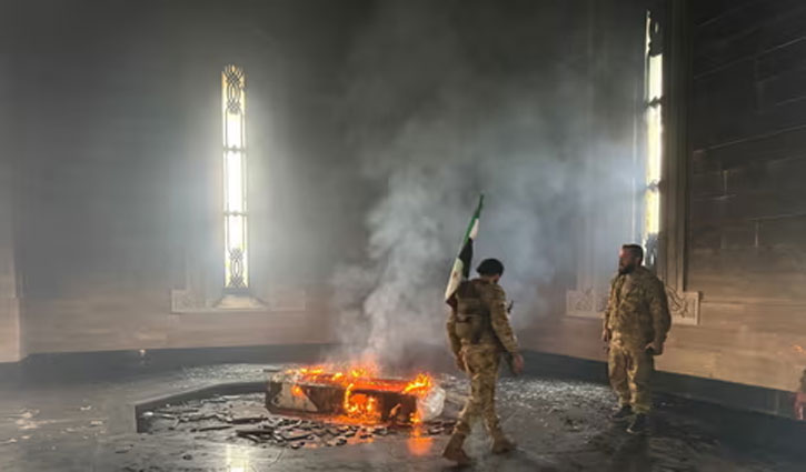 Syria rebels burn tomb of Bashar al-Assad`s father