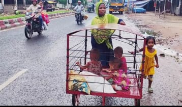 লোহার খাঁচায় সন্তান নিয়ে পথে নেমেছেন জান্নাত