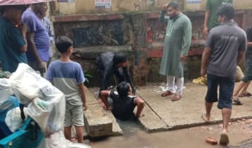 Child rescued from drain dies 