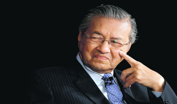 Malaysia ex-PM Mahathir, 100, discharged from hospital