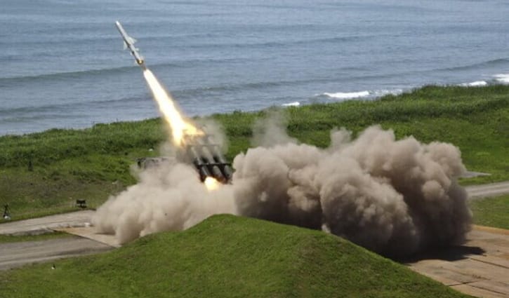 Japan test-fires missile from home soil for first time Japan test-fires missile from home soil for first time
