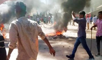 নেত্রকোনায় জাতীয় দলের ফুটবলারকে মারধরের প্রতিবাদে বিক্ষোভ