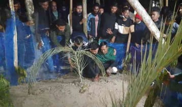 স্ত্রী-সন্তানের কবরের পাশে সেই সাদ্দাম, ‘এটা পরিকল্পিত হত্যাকাণ্ড’