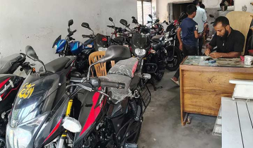 সিরাজগঞ্জে মোটরসাইকেল বিক্রি কমেছে, কাগজপত্র করতে ভিড়